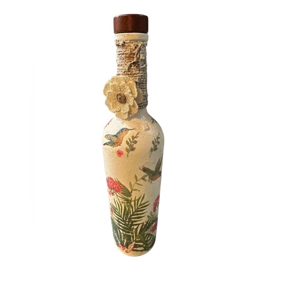 Handcrafted bottle up-cycle with floral and birds